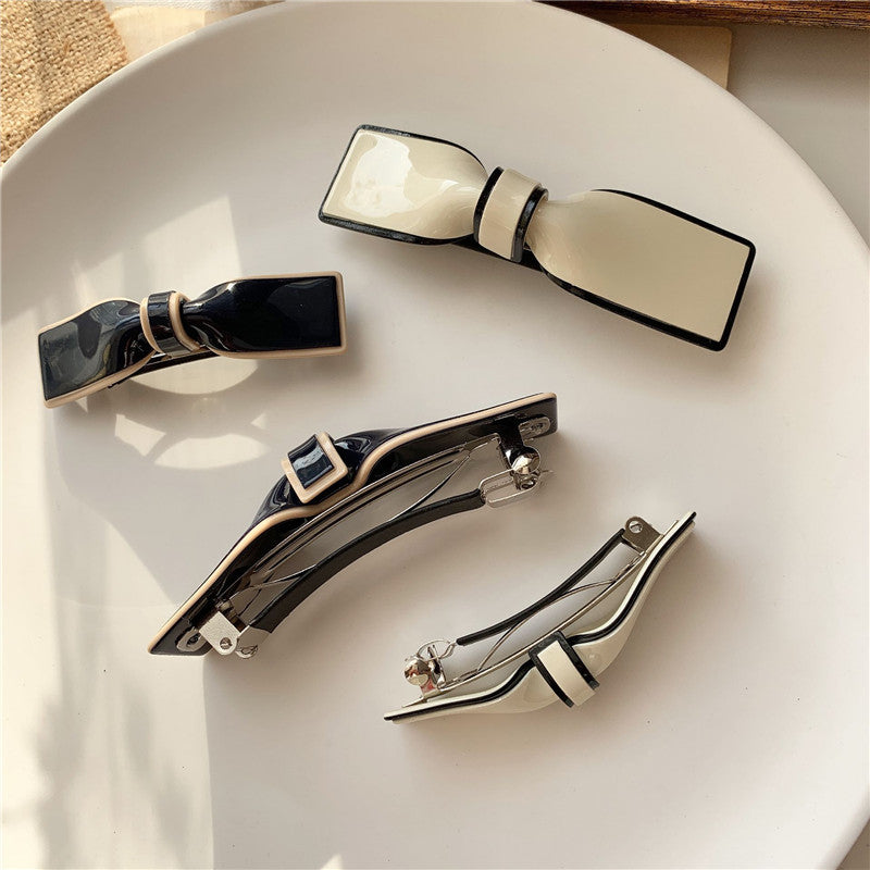 Elegantní skřipec do vlasů ve tvaru mašle