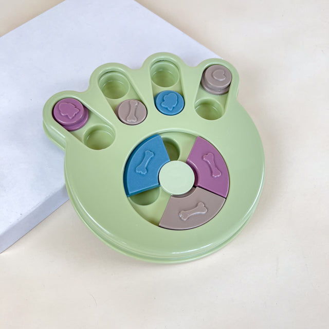 A bowl against devouring with a puzzle for dogs