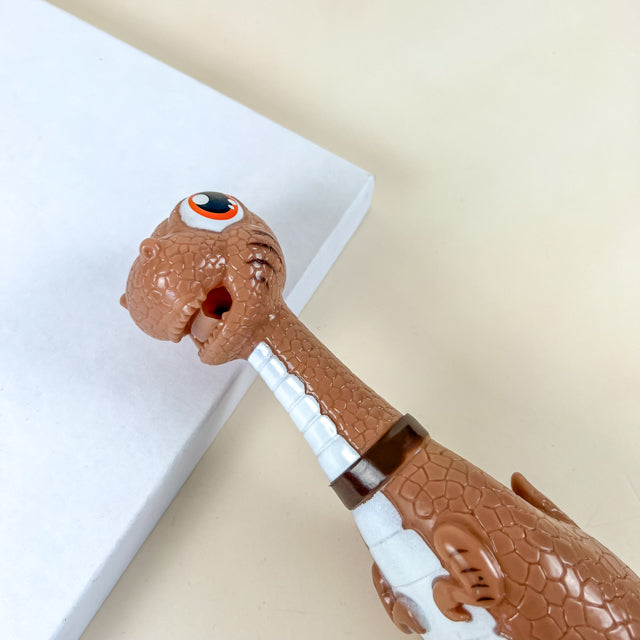 ANNAM Malý pískací dinosaurus 22 cm
