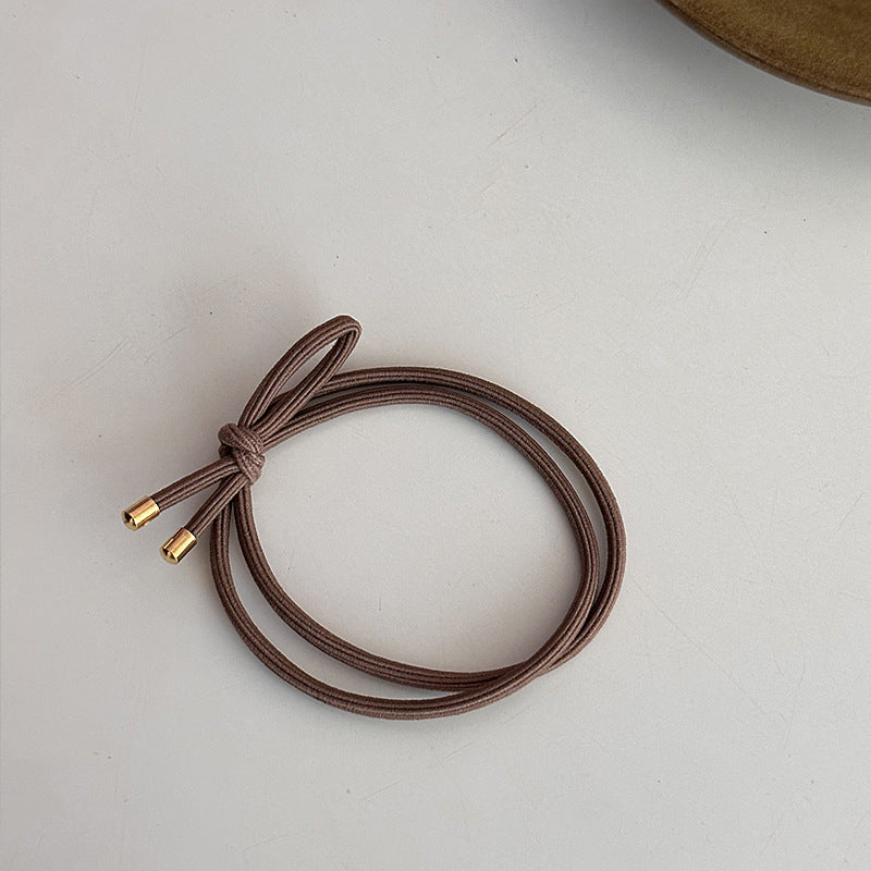 Minimalistická gumička s uzlem