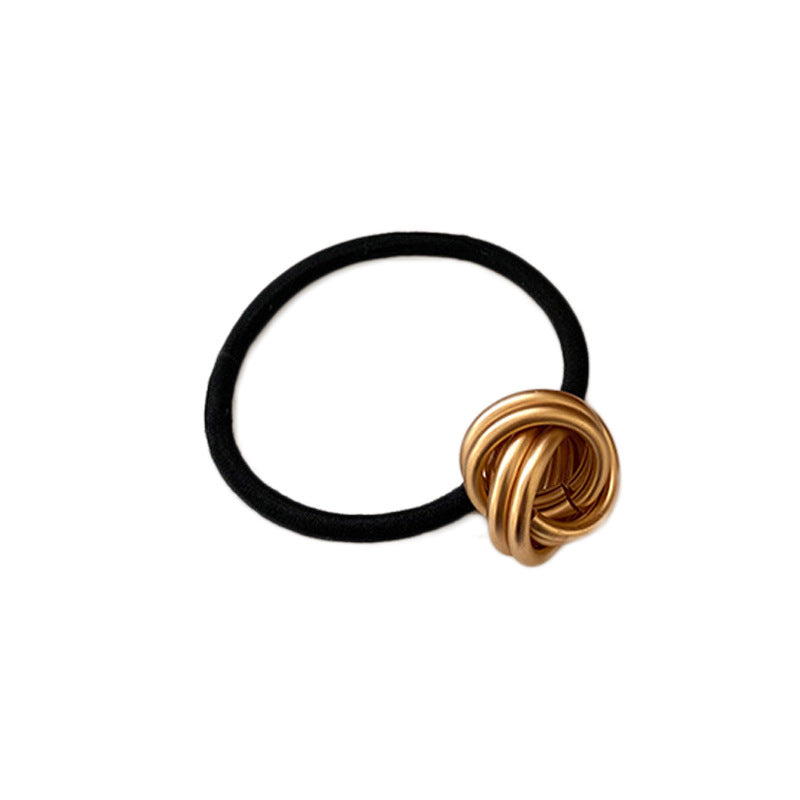 Korejská gumička se zlatým pleteným prstenem
